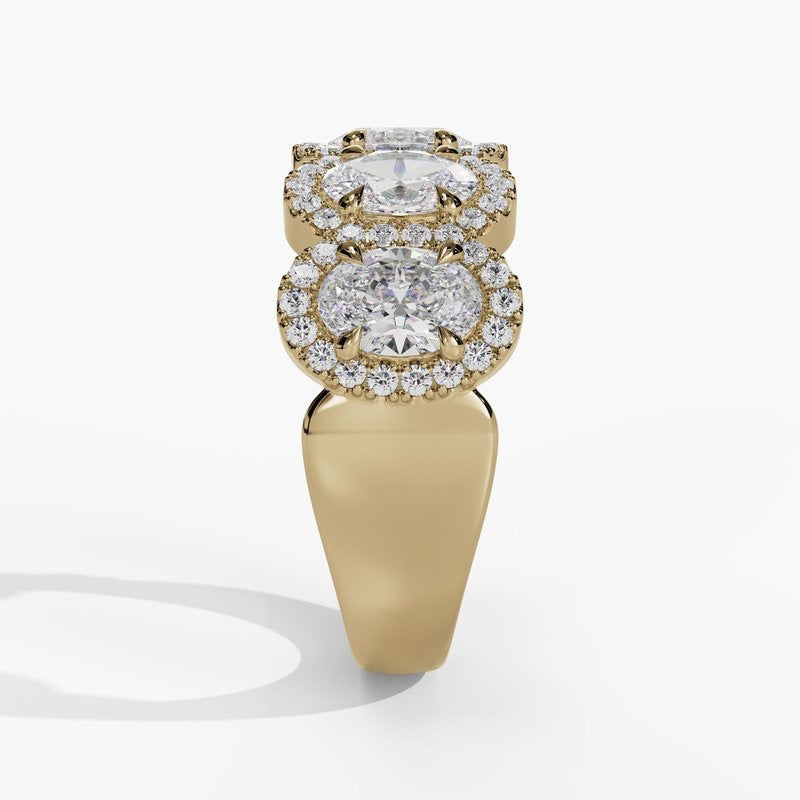 5 Stone Oval Cut Diamonds With Round Diamond Halo Band